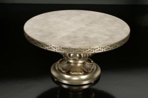 Fig. 5. Lotus low table, designed by Mont, 1963 for the Orlowitz penthouse. Maple finished in silver leaf with gold leaf accents; height 15 1/2, diameter 30 inches. Private collection.