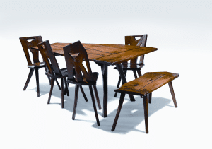 Dining set by Esherick, 1928. Walnut with ebony trim; height (of table) 28 ½, length 62, width 41 ½ inches. The five-sided table was made for the dining room of the Esherick family farmhouse. Courtesy of the Wharton EsherickMuseum, photograph by Elizabeth Field.