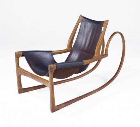 Wendell Castle, oak sleigh chair with hard leather sling seat, 1963