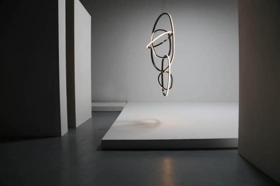 “Shoulder” Light Installation, by Niamh Barry, IRE, 2013. Black patinated and mirror polished hand formed solid bronze, opal glass and LED lights.