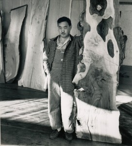 The work of American Craft pioneer George Nakashima, seen here in the 1950s with a slab of wood, his medium of choice, has never been more in demand (photo courtesy of Nakashima Studio). Top: New York dealer Todd Merrill recently acquired a remarkable suite of the creator’s furniture.