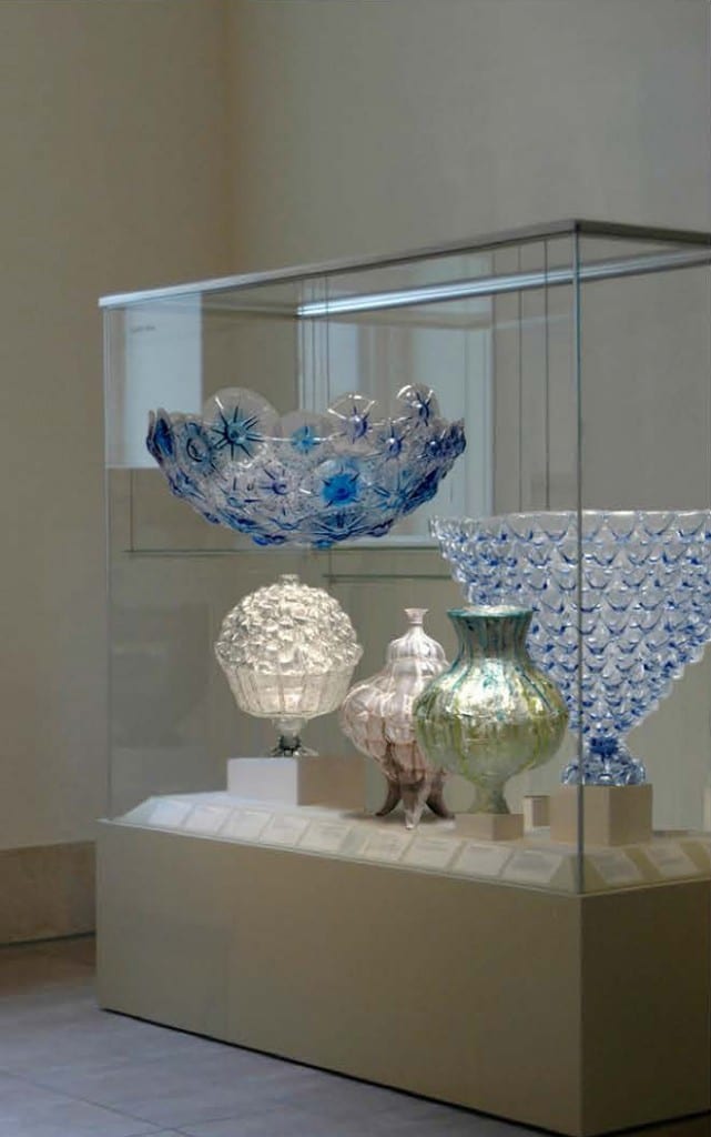 Shari Mendelson, My Metropolitan: “In this digital collage, I replaced the art in a Greek and Roman gallery at the Metropolitan with vessels made from discarded plastic bottles.”